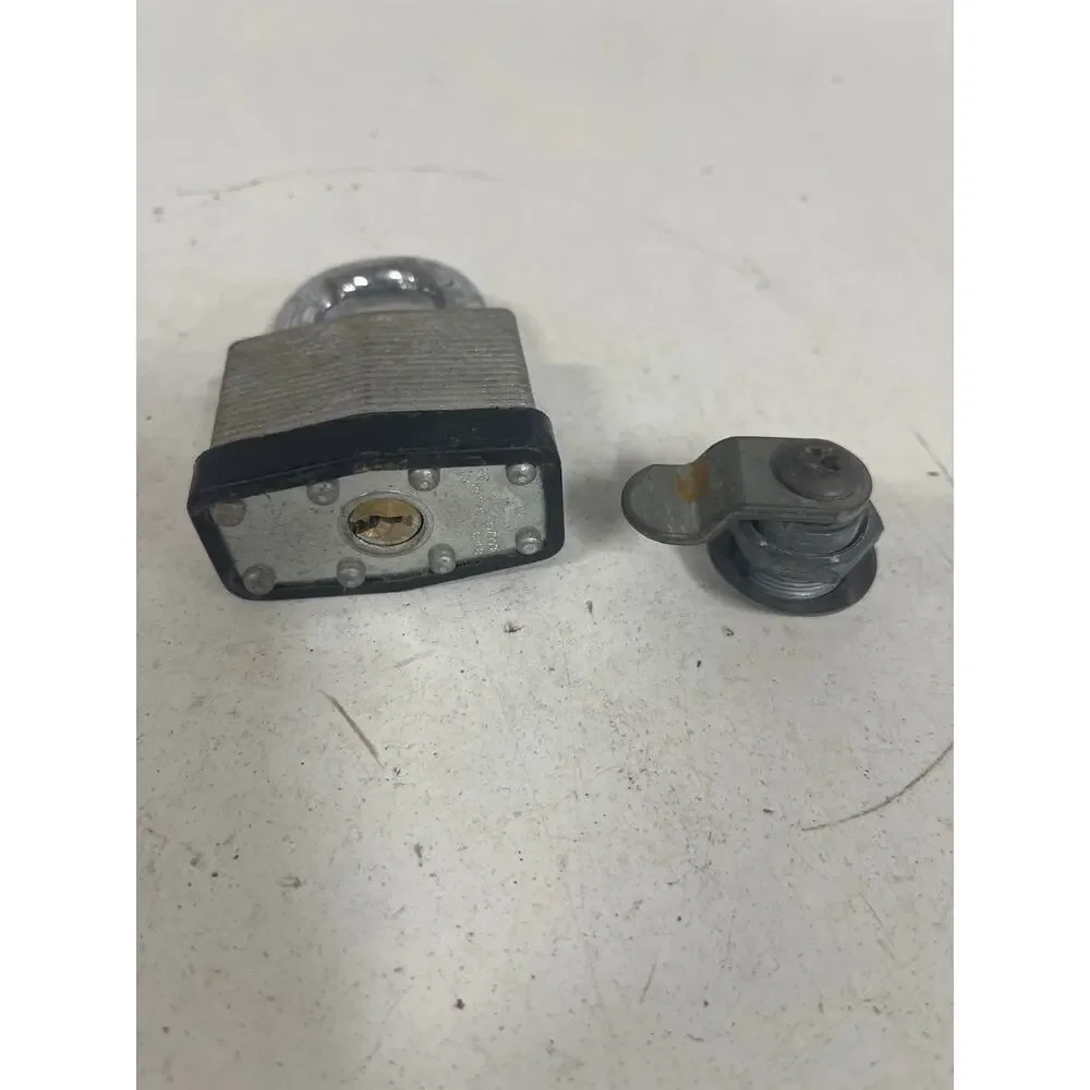2 locks a door/cabinet lock and padlock both w/o key